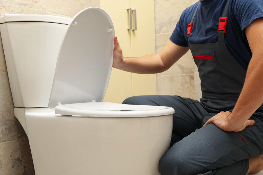 man at toilet